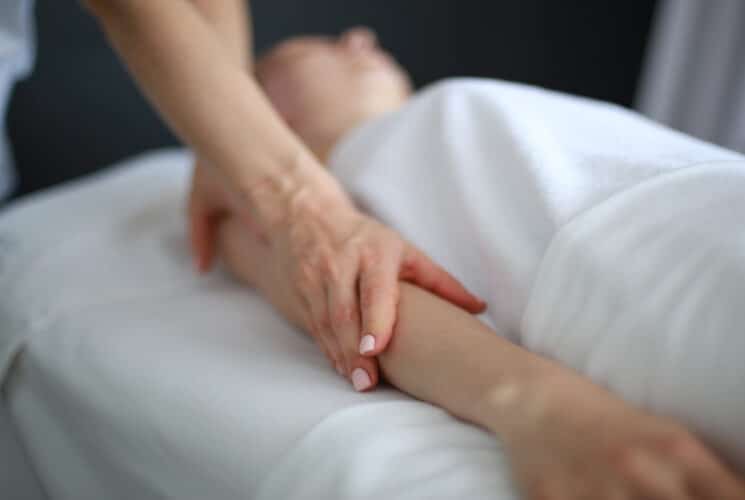 a woman getting an arm massage